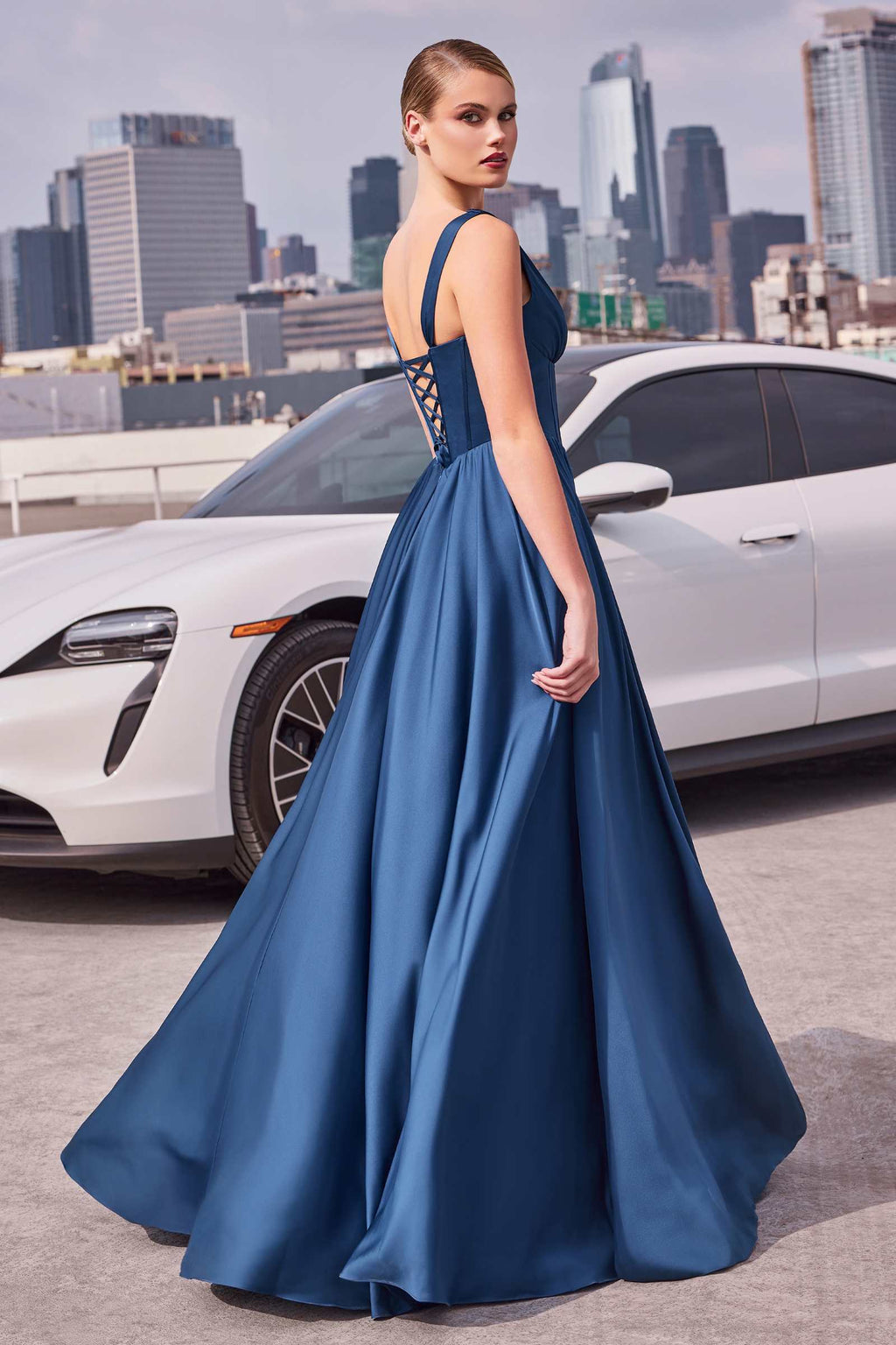 Navy A-line satin gown with V-neck, cross-front bodice and full skirt
