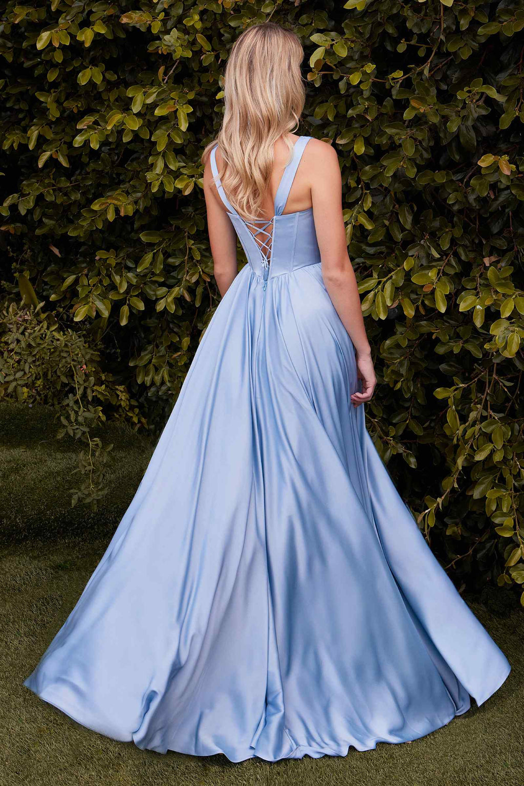 Light blue A-line satin gown, open-back bodice and full gathered skirt