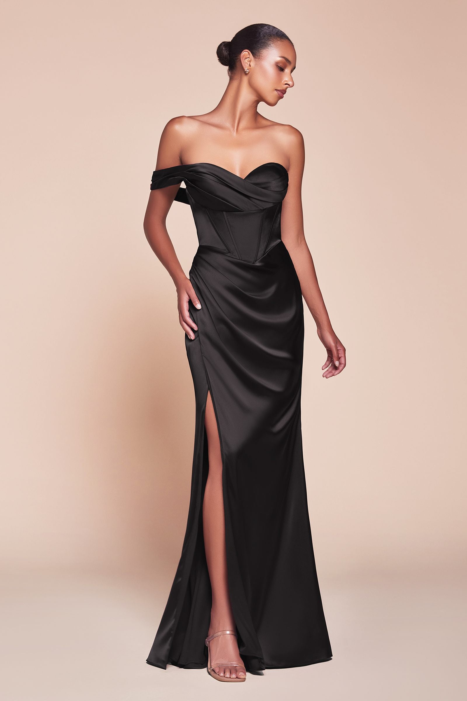 Black satin corset gown with off-shoulder neckline and thigh-high slit