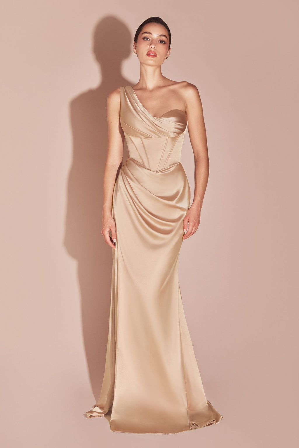 Long one-shoulder satin corset gown with draped cowl bodice, gold tone.