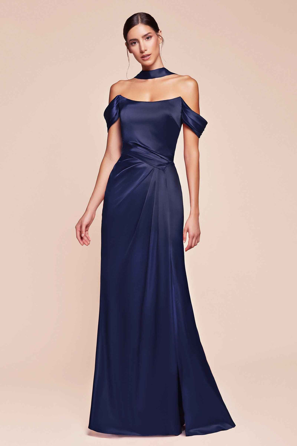 Off-shoulder dark navy satin gown with gathered waist and front slit, full length.