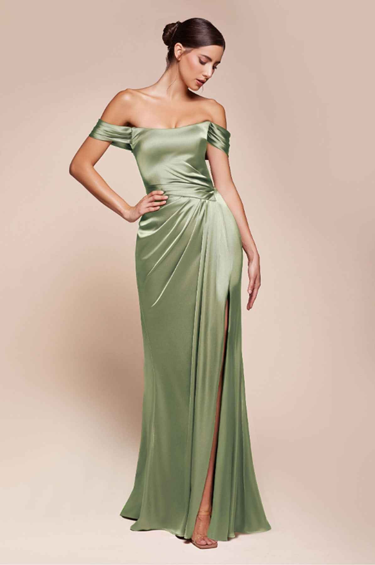 Off-shoulder sage green satin gown with ruched waist and front slit, full length.