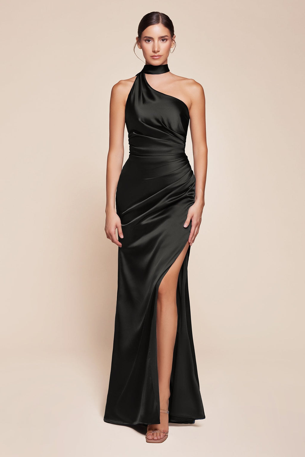One-shoulder fitted satin gown with side slit, black glossy finish.