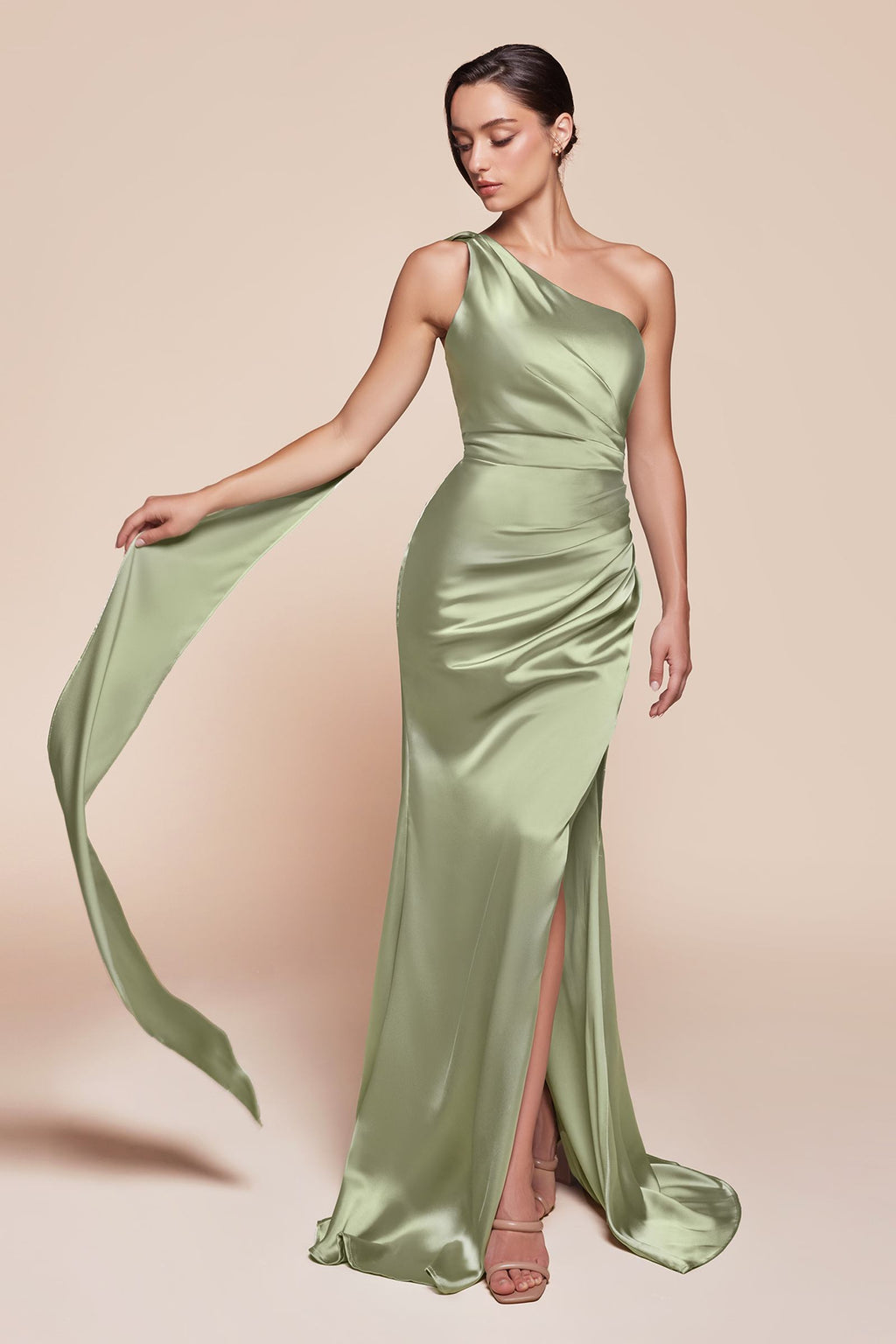 One-shoulder fitted satin gown with side slit, sage green glossy drape.