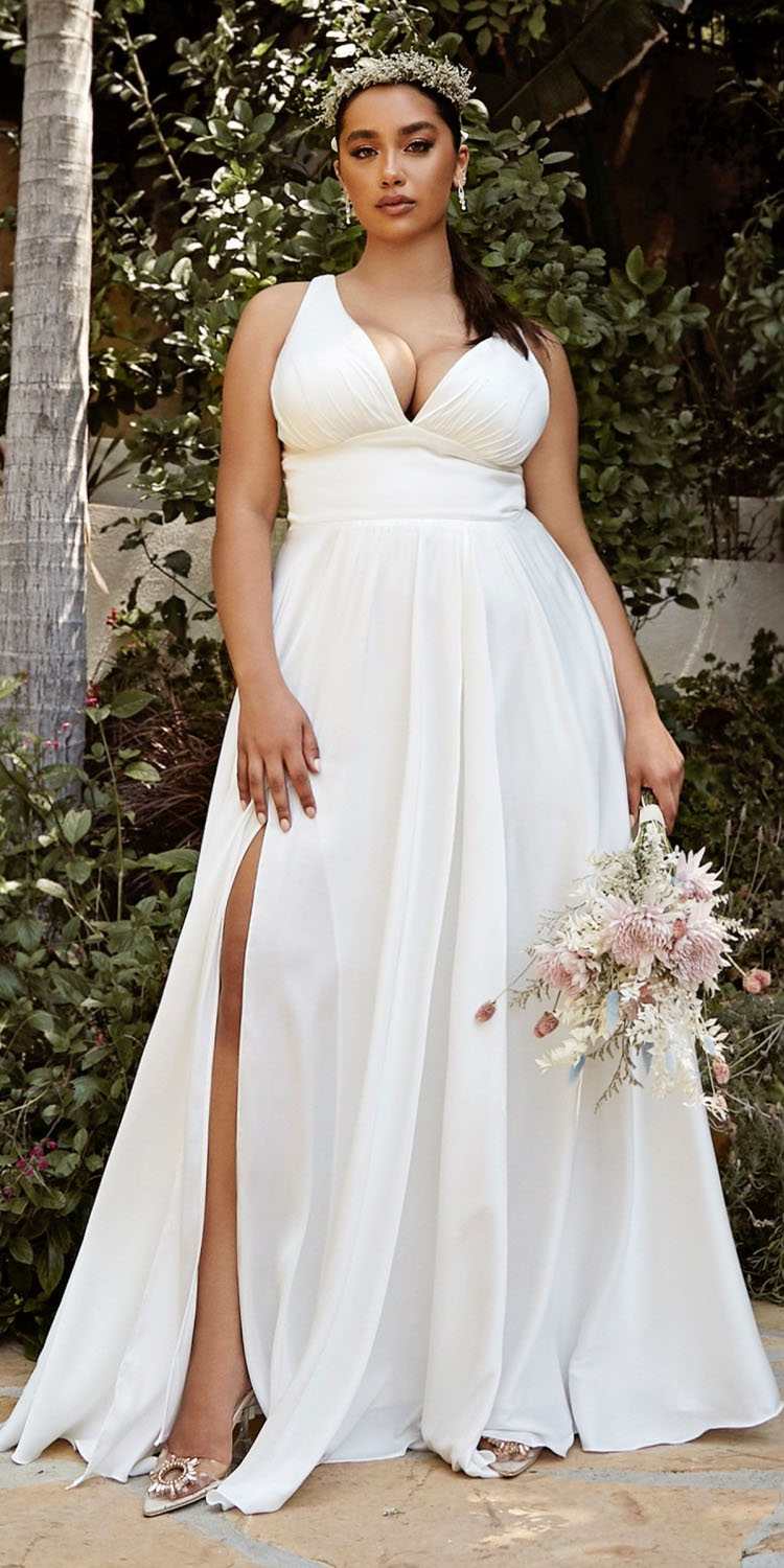 Long formal A-line satin dress with deep V neckline, gathered waist, flowing skirt