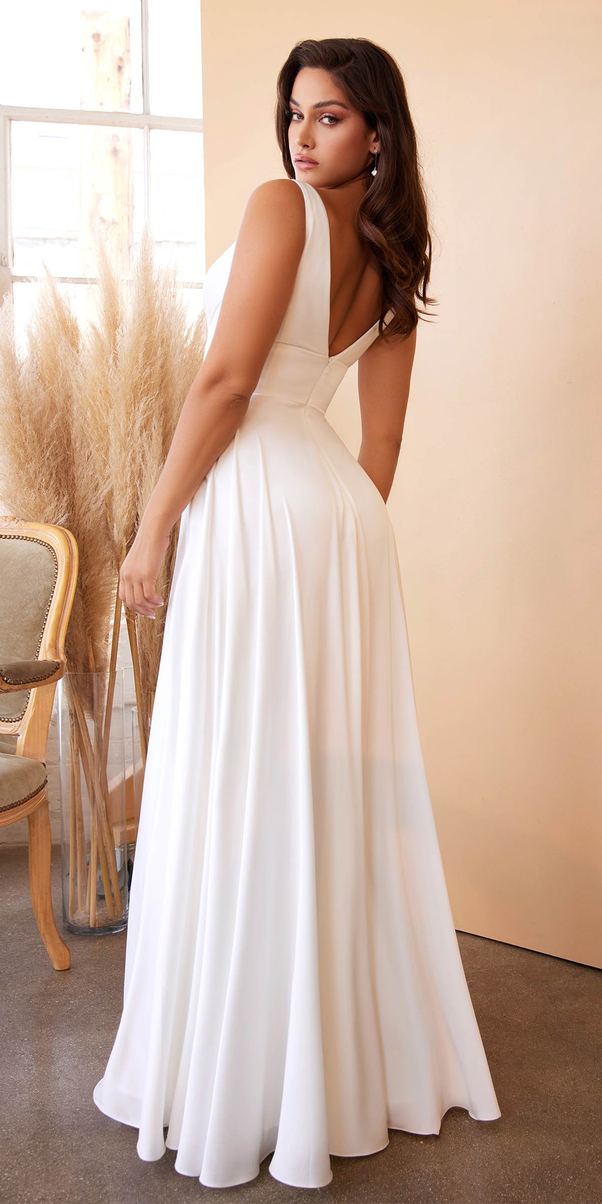 Off white V-neck satin A-line formal dress with open-back detail and skirt