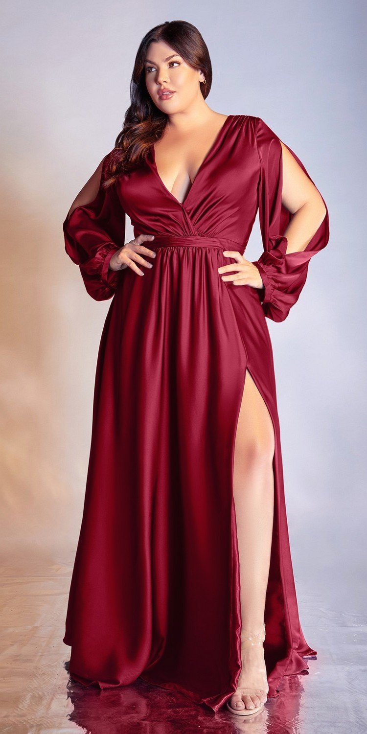 Long formal dress in burgundy with v-neck, ruching, and thigh slit