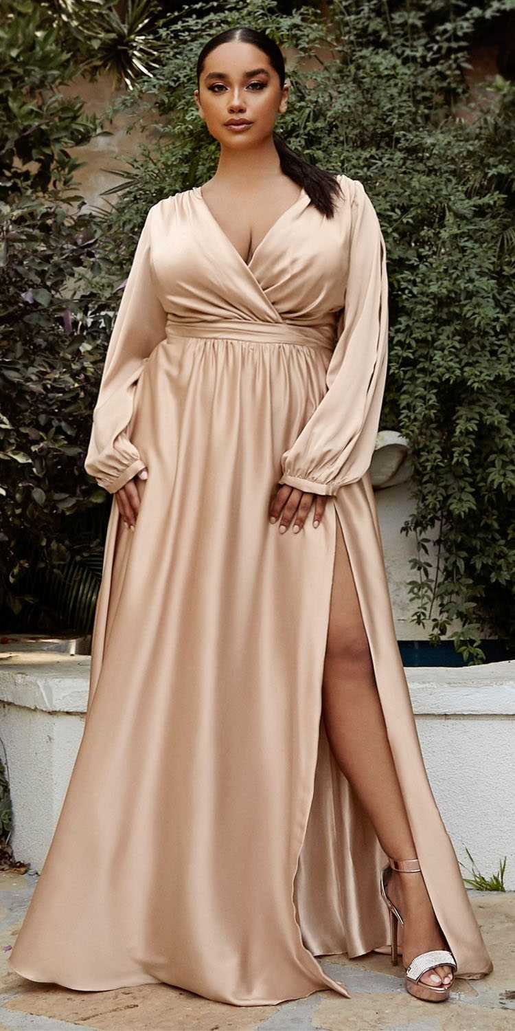 Long formal dress in champagne with draped v-neck and flowing side slit