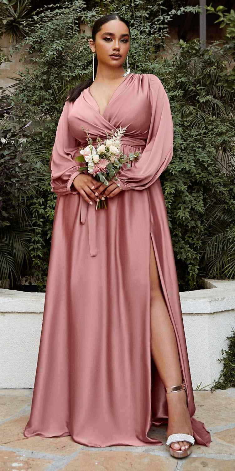Long formal dress in dusty rose with long sleeves, v-neck, and thigh slit