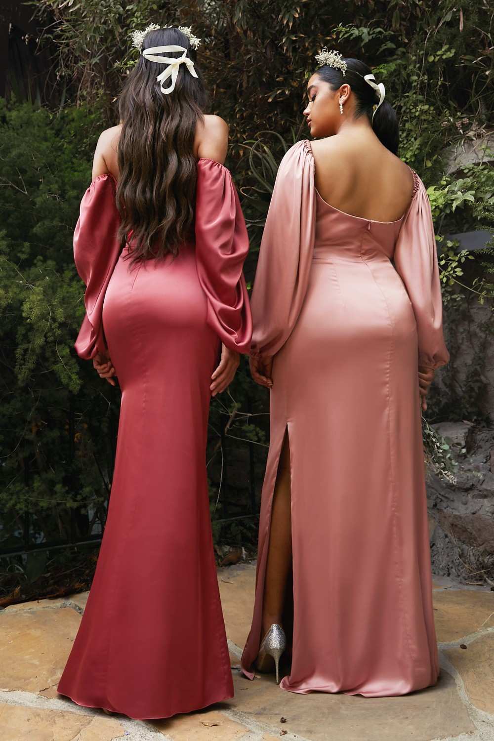Off-shoulder satin fitted long-sleeve dress in rose and maroon, draped sleeve cuffs, back view