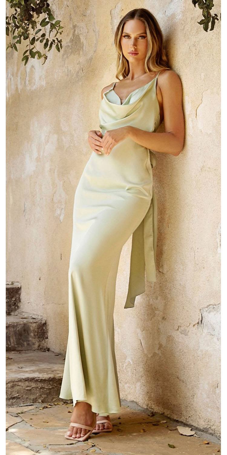 Light yellow satin cowl-neck maxi dress with draped neckline and spaghetti straps