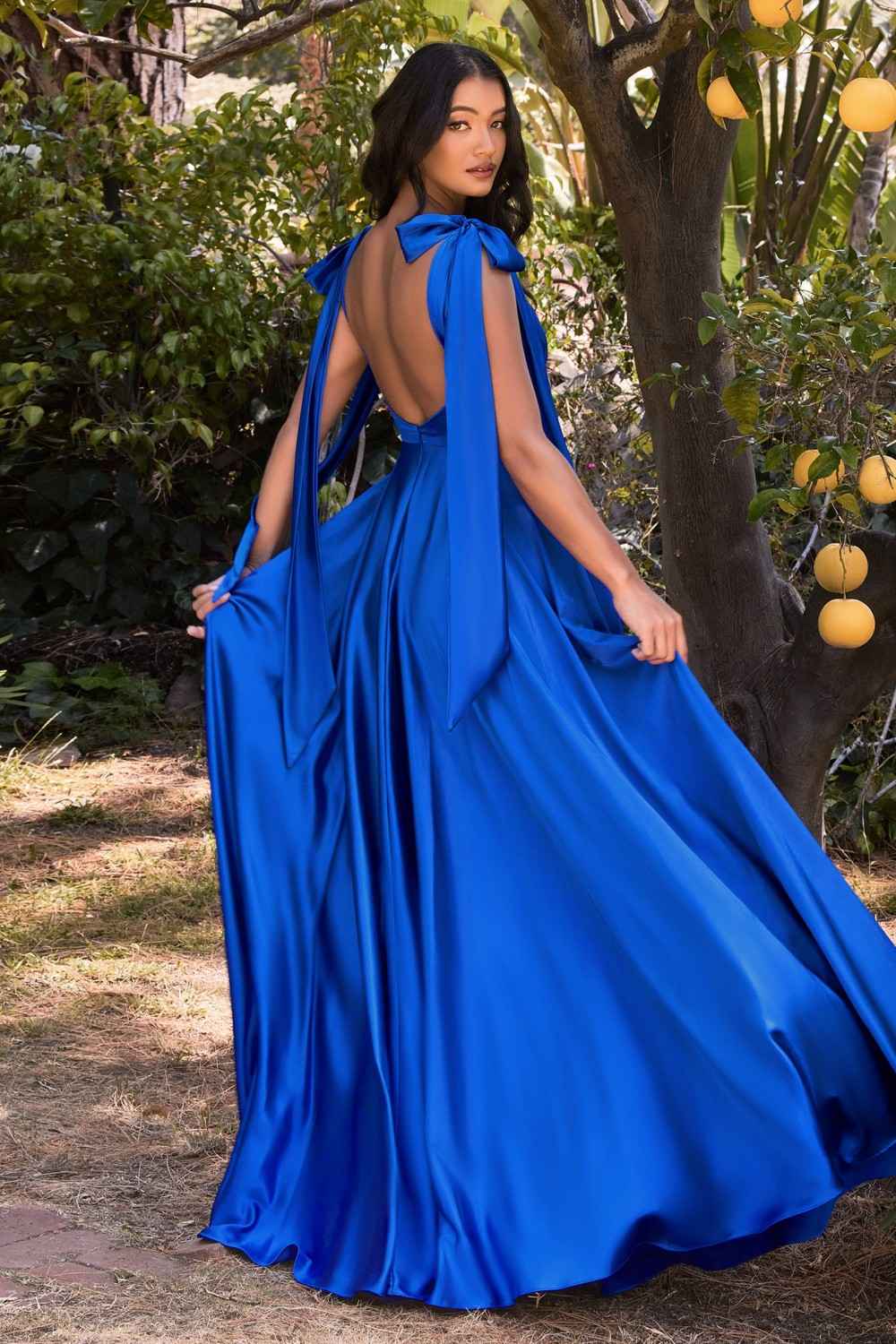 Blue satin long dress with square neckline and draped shoulder ties, full skirt