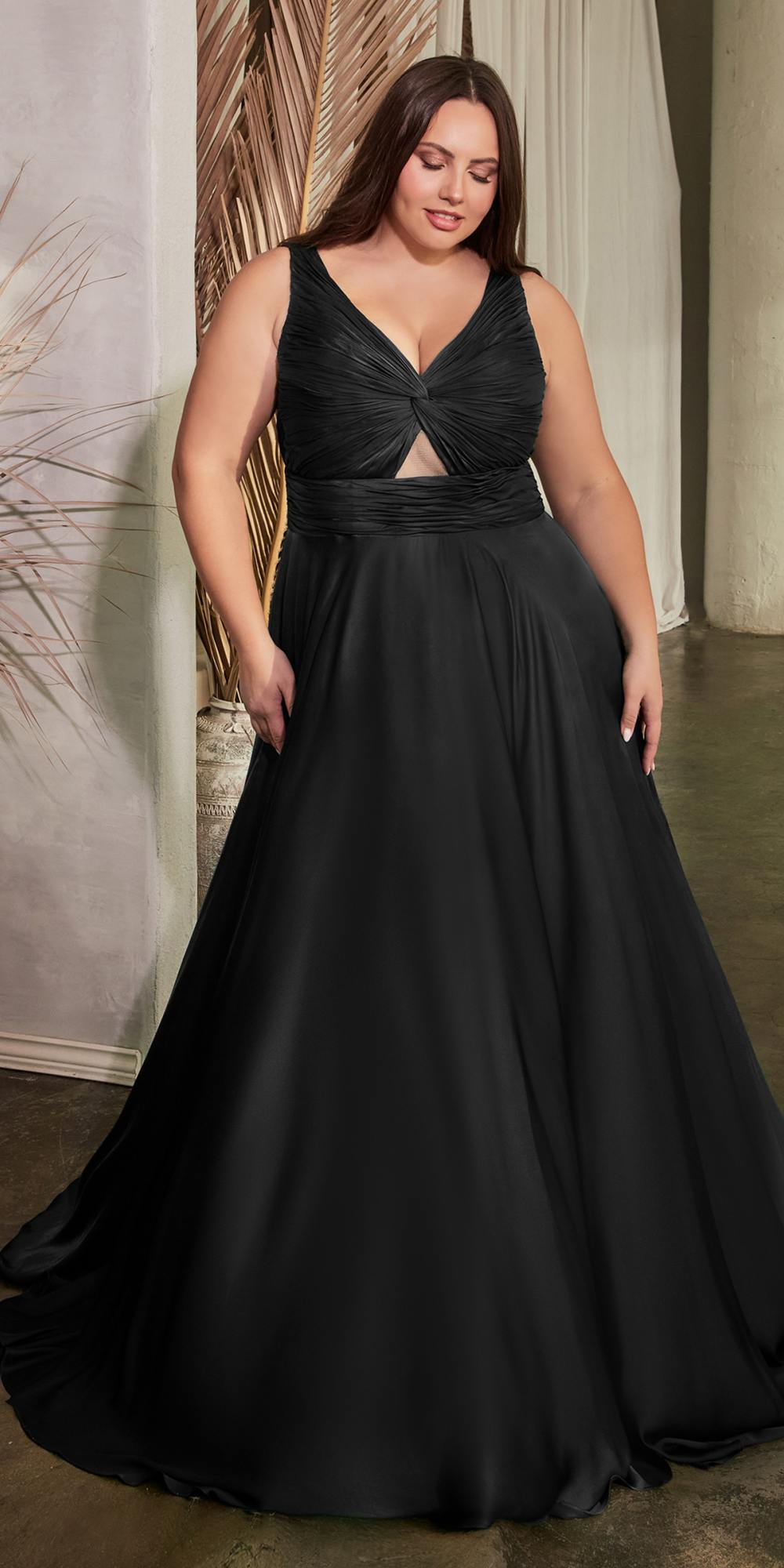 Black satin A-line formal gown with V-neck twisted bodice and gathered waist
