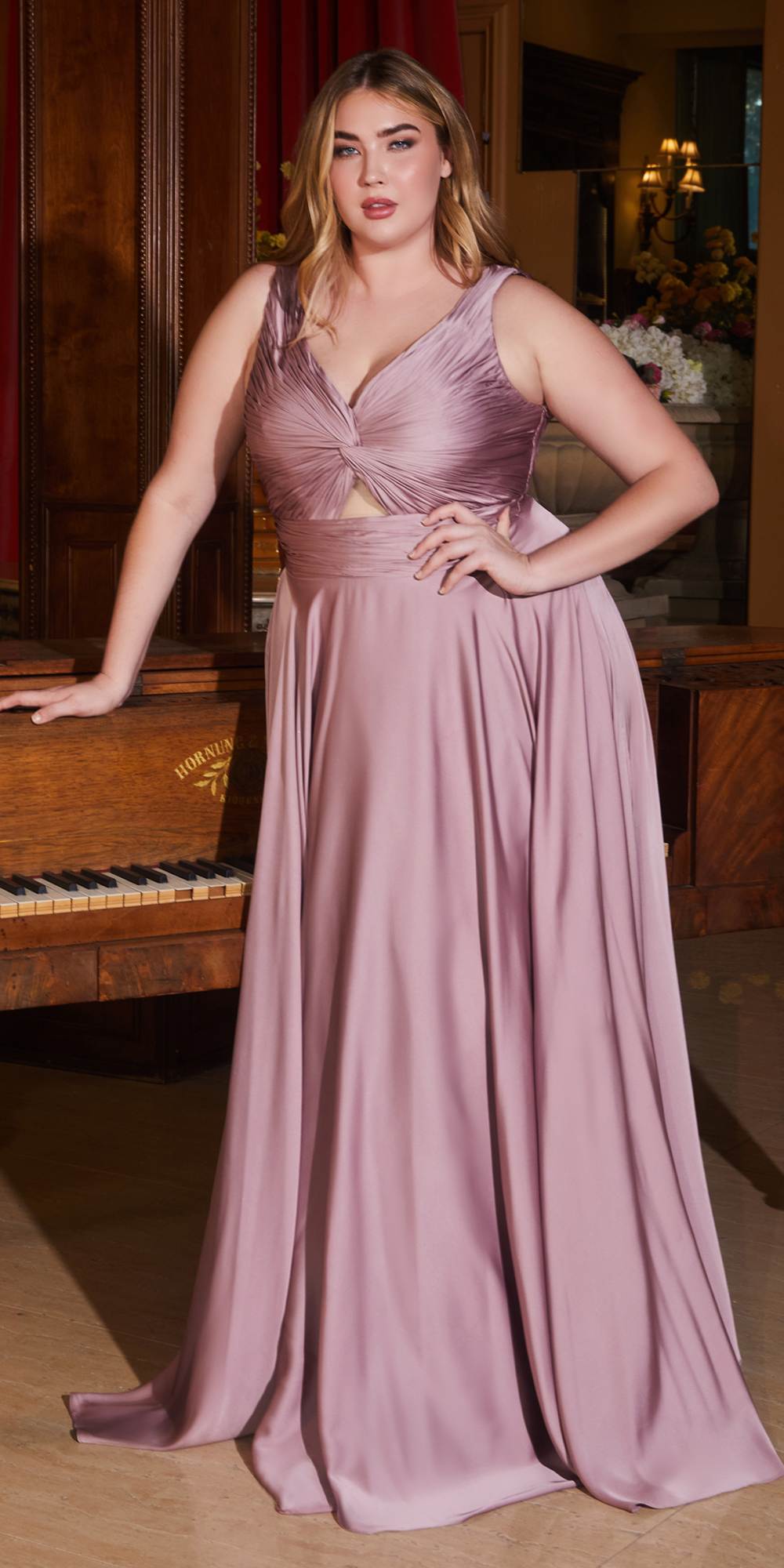 Formal satin A-line gown in mauve, twisted bodice keyhole neckline, full flowing skirt.