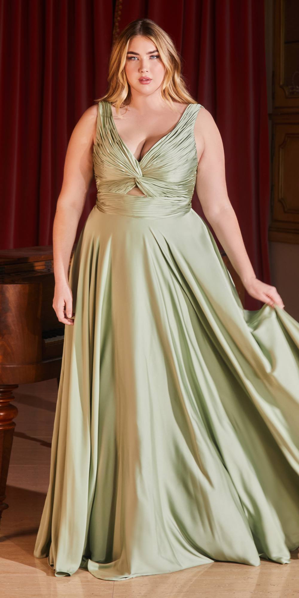 Formal satin A-line gown in sage green, twisted V-neck keyhole bodice, sleeveless.
