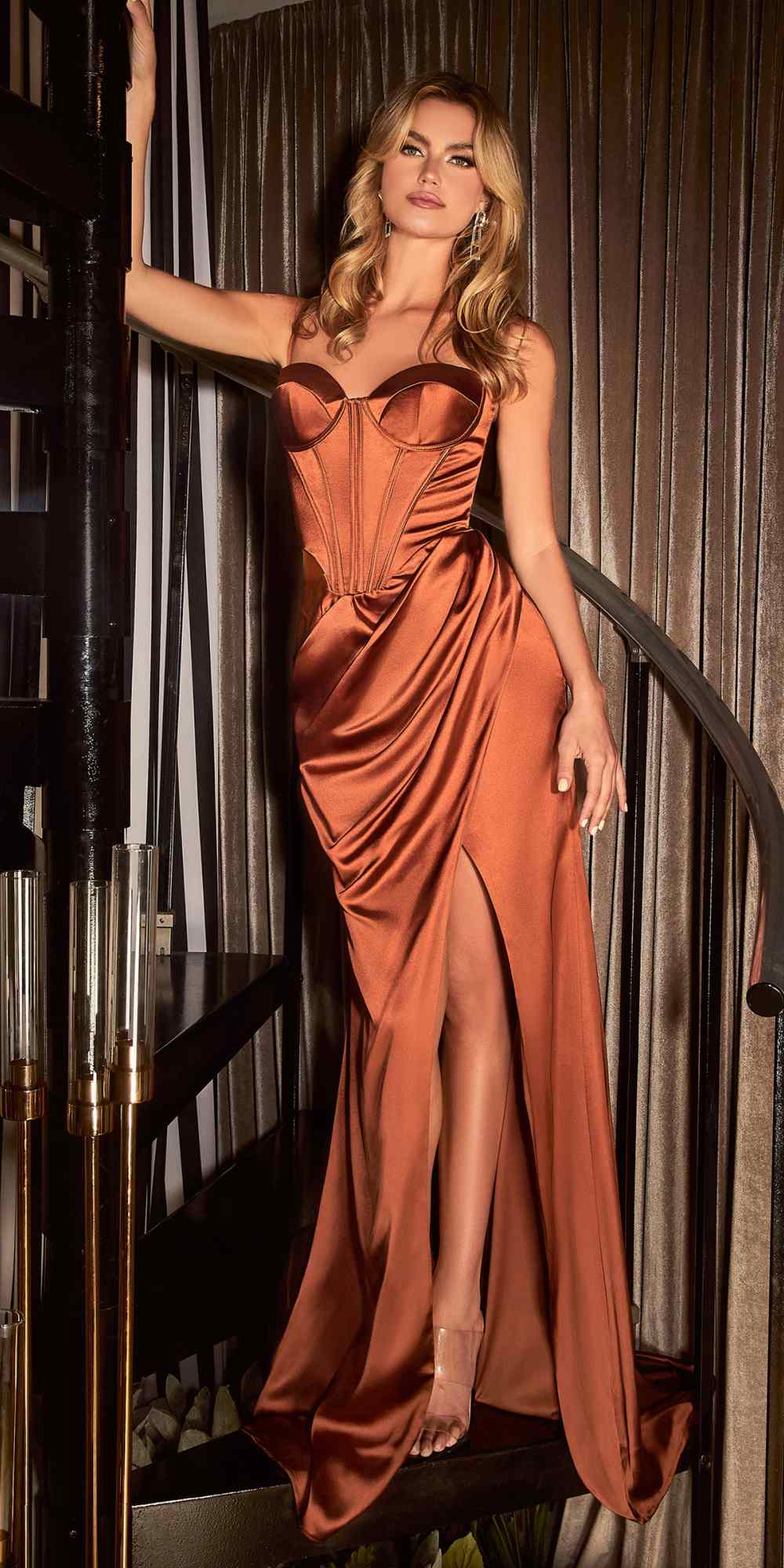 Copper satin draped gown with sweetheart neckline and high slit
