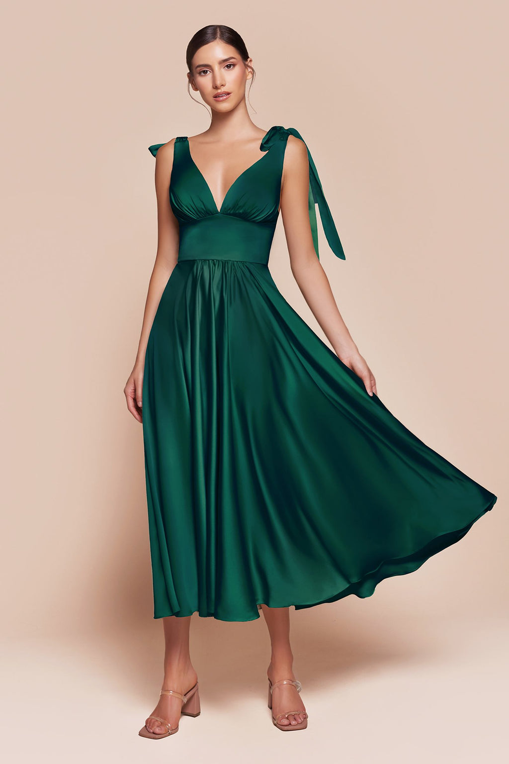 Satin A-line tea-length dress in dark green with V-neck and tie shoulder details