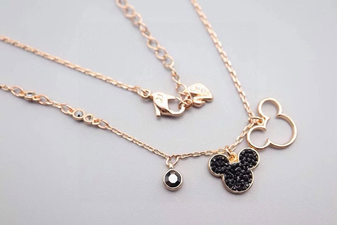 Rose gold necklace with black stone Mickey head charm and small circular black pendant