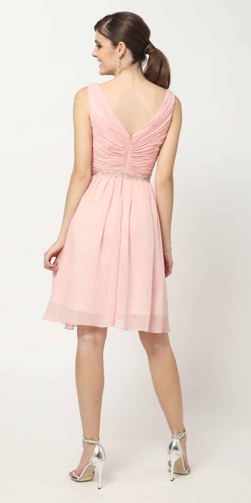 Ruched V-back cocktail dress in pale pink with embellished waist and sleeveless flared skirt