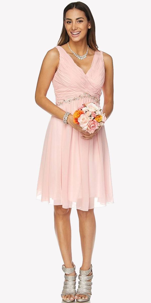 Ruched V-neck cocktail dress in pale pink with embellished waist and sleeveless flared skirt