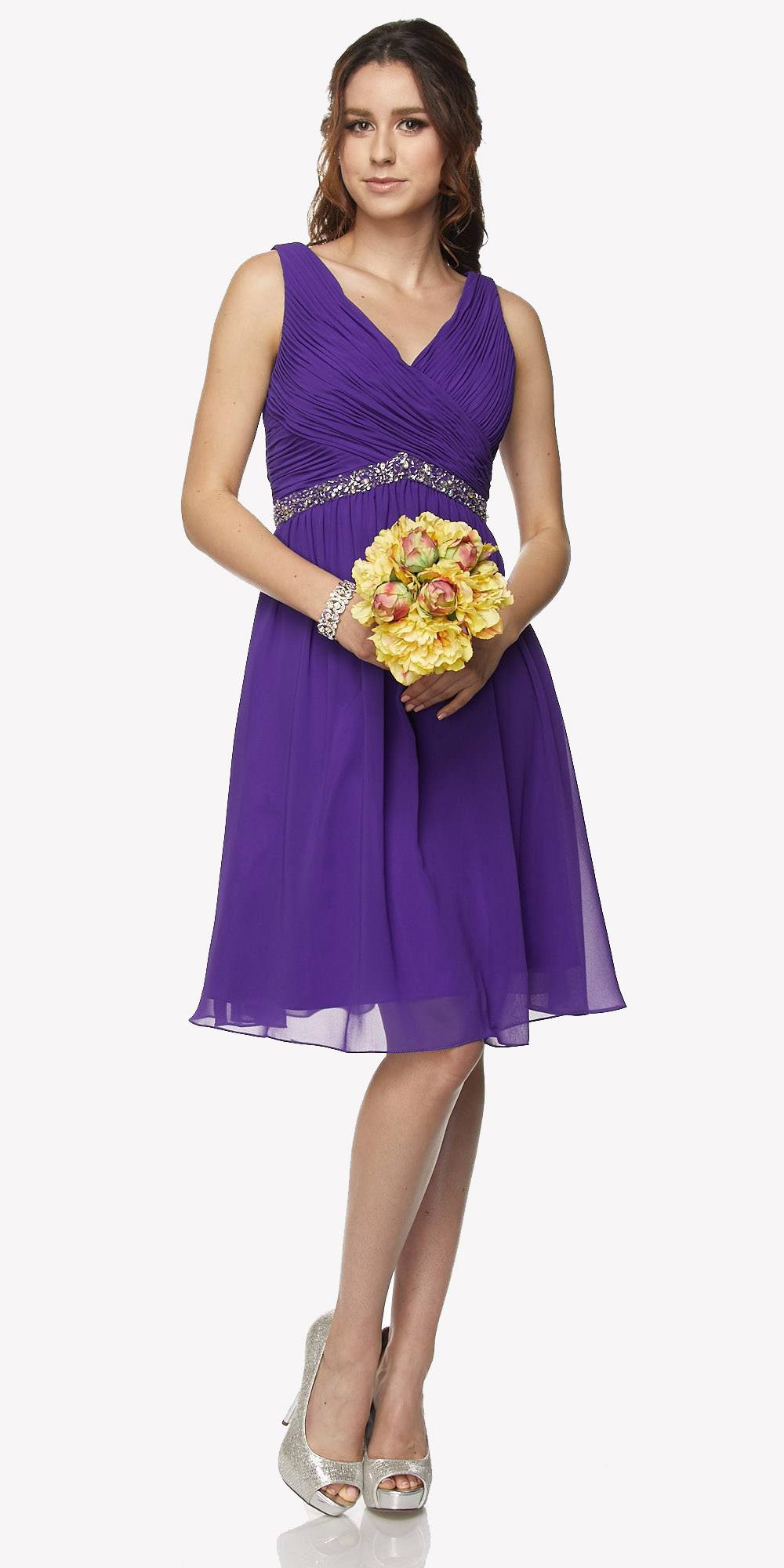 Ruched V-neck cocktail dress in purple with embellished waistband and sleeveless skirt