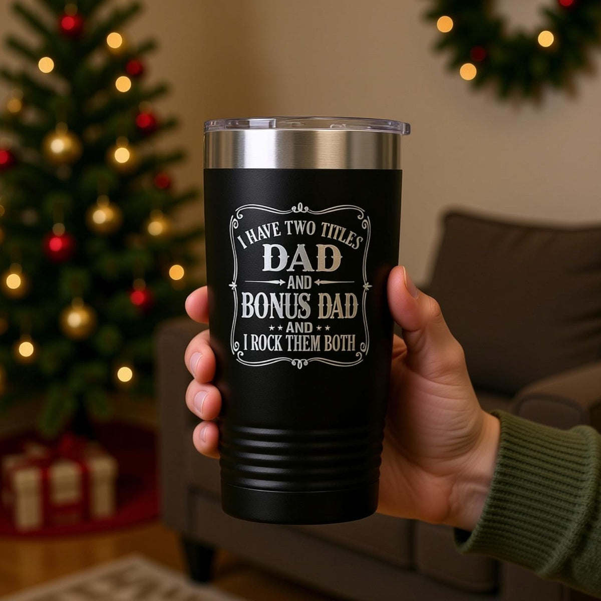 Black travel tumbler with silver lid and 'Dad and Bonus Dad' quote graphic