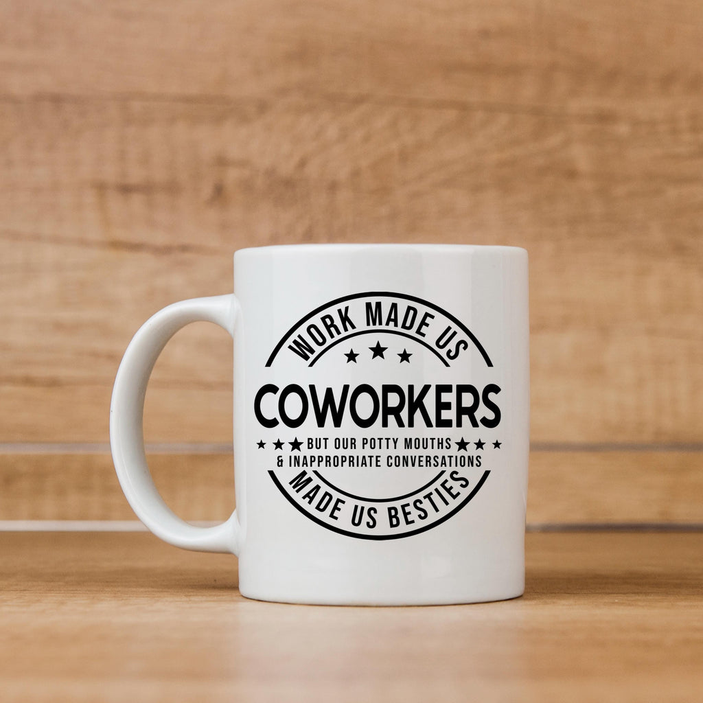 White ceramic mug with black “COWORKERS” design, front view with handle