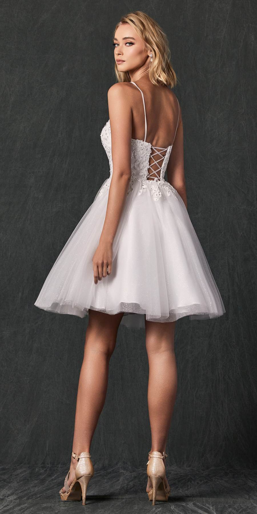 Off-white short floral applique dress viewed from the back with tulle skirt