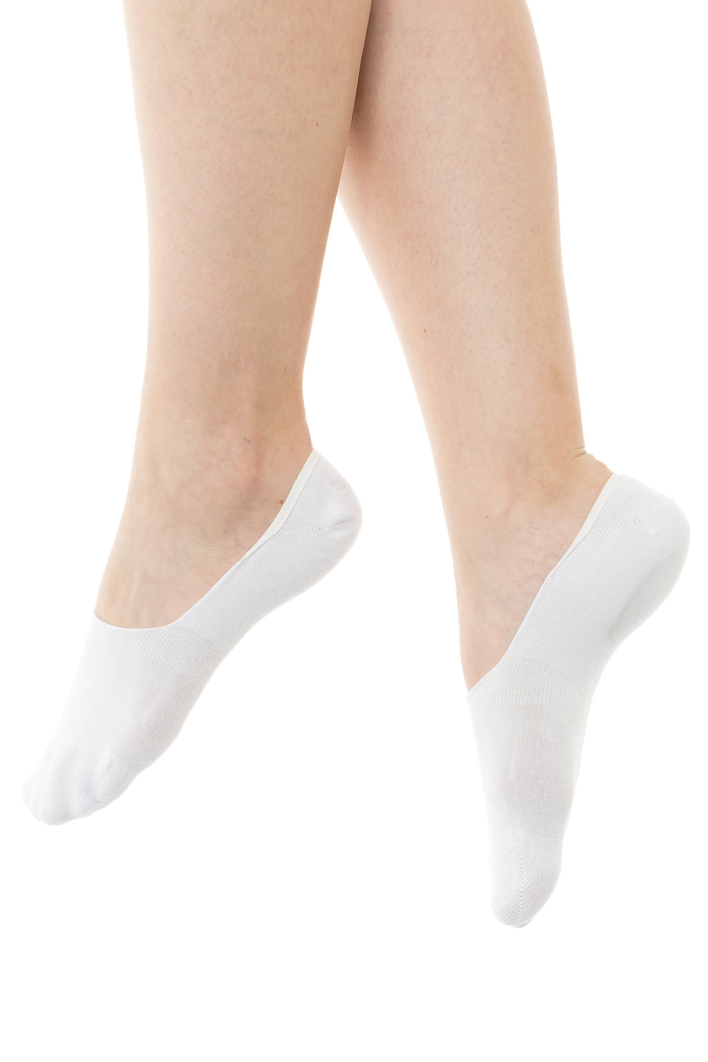 Pair of white no-show socks on bare legs