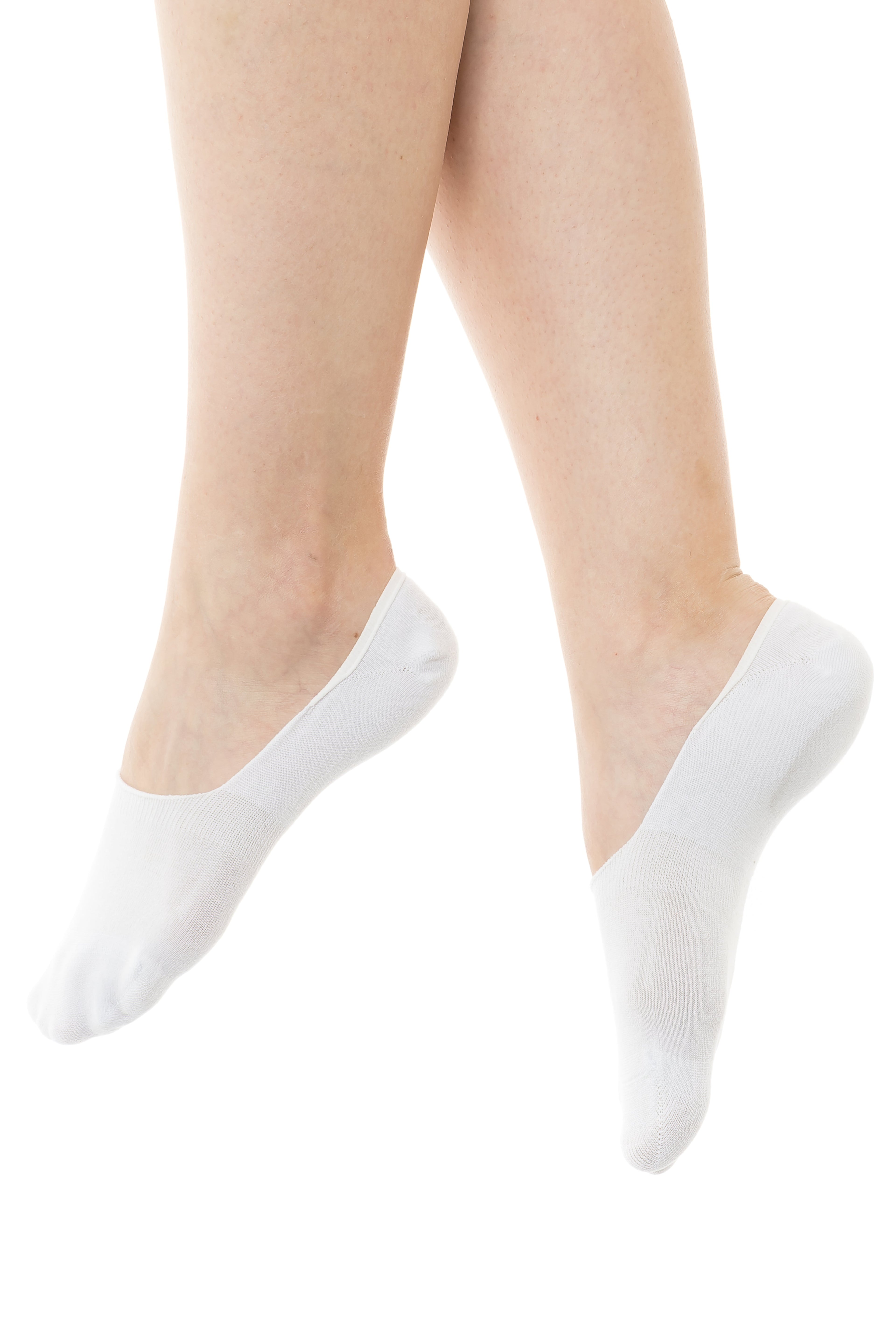 Pair of white no-show socks on bare legs