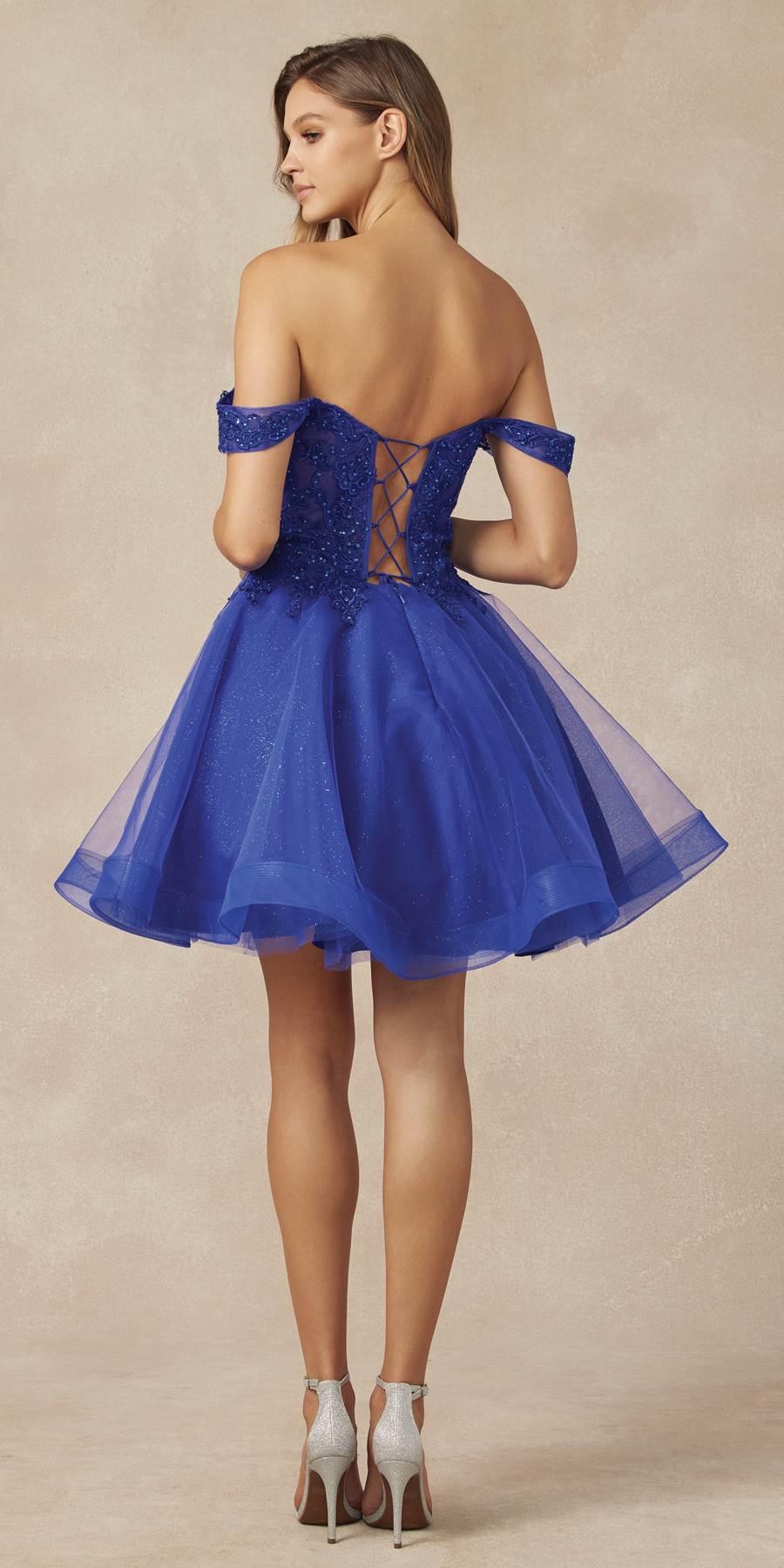 Glitter tulle A-line homecoming dress in royal blue, back view with crisscross detail