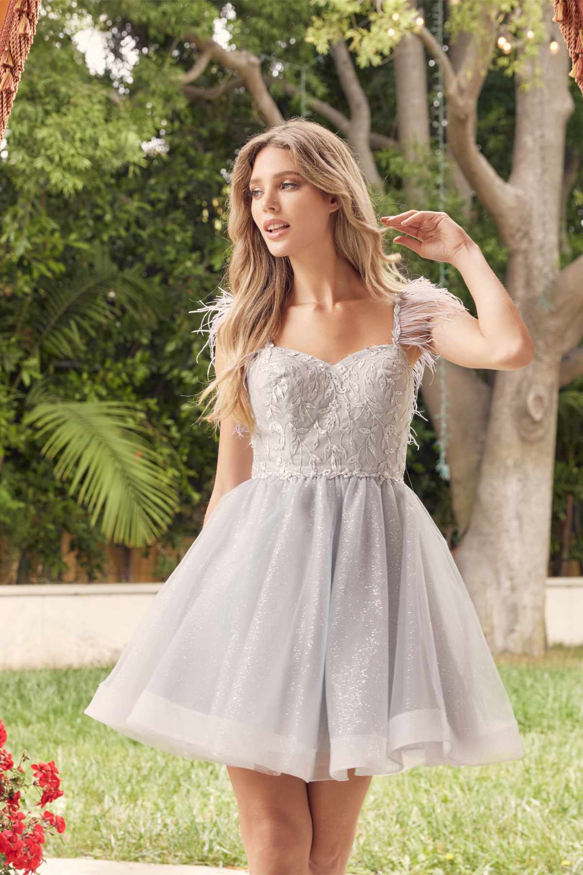 Silver short A-line tulle dress with sheer corset bodice and feather straps