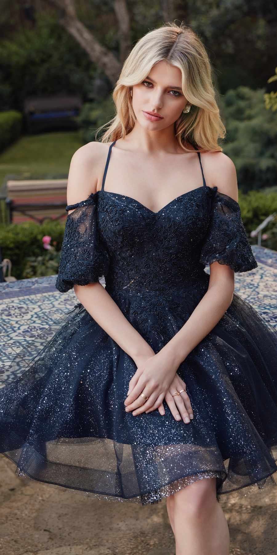 Black off-shoulder A-line tulle dress with sparkly corset bodice and puff sleeves