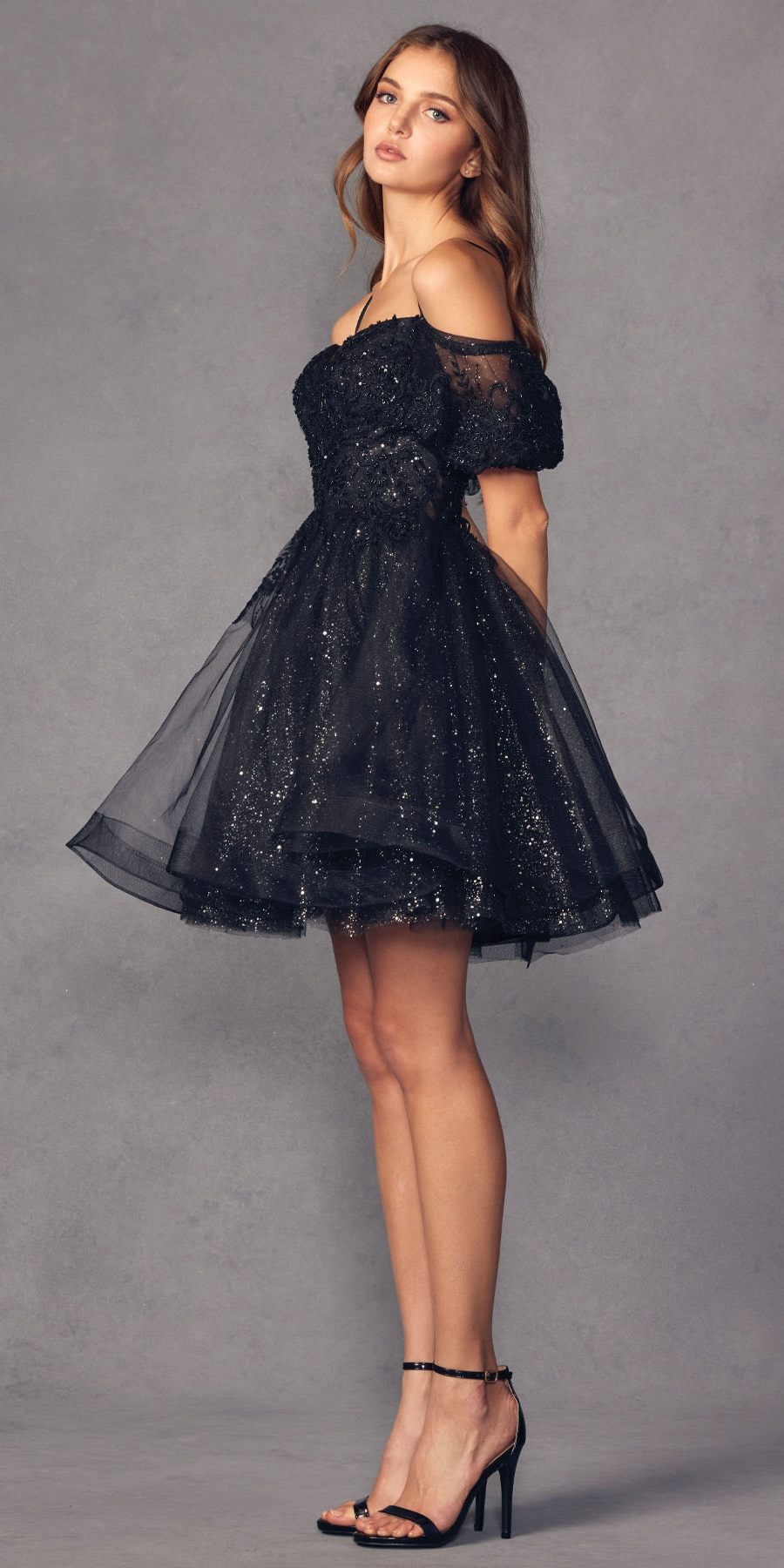 Black off-shoulder A-line tulle mini dress with puff sleeves and glittery corset bodice