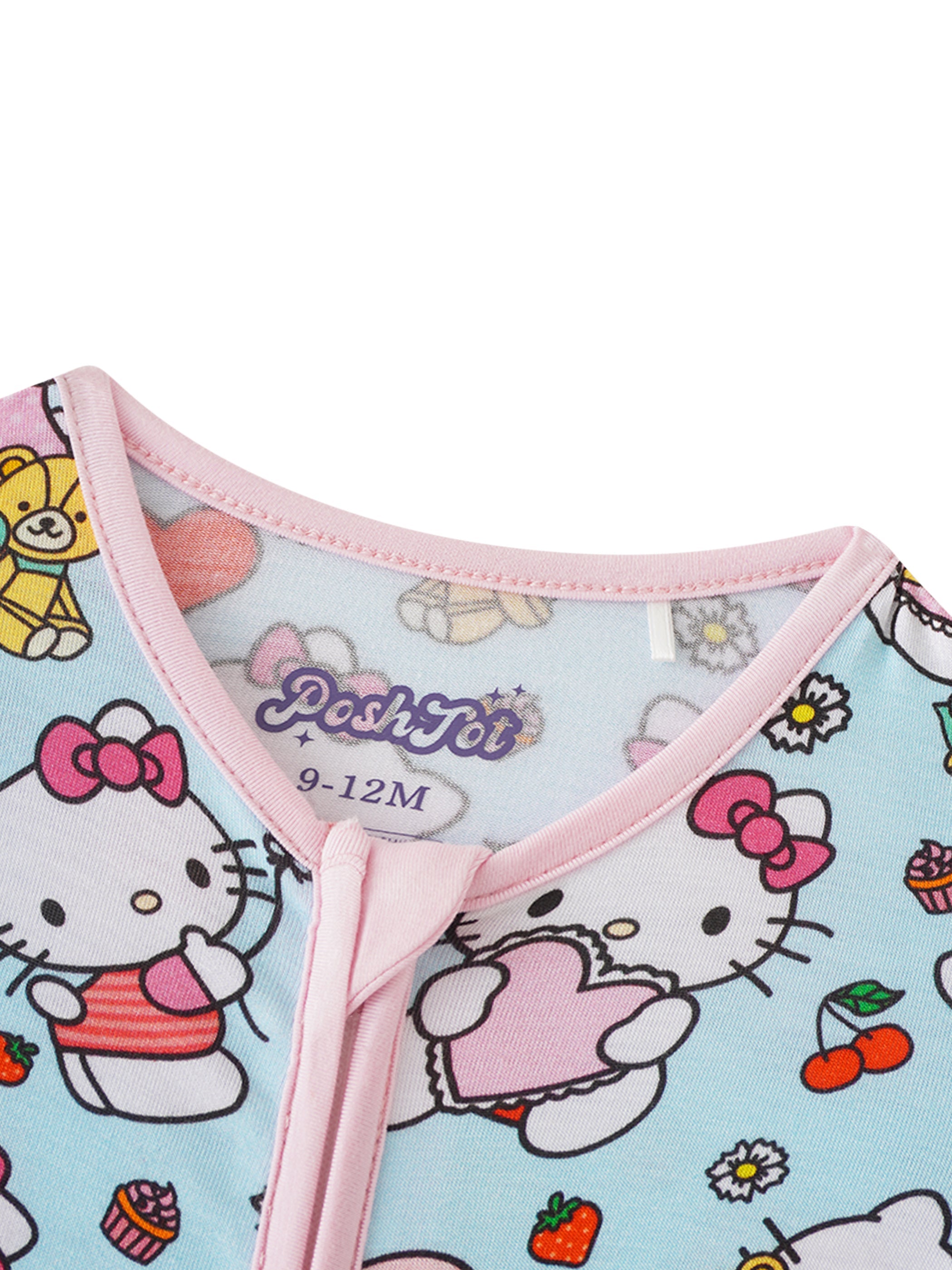 Bamboo baby romper neckline with pink trim and Hello Kitty friends graphic