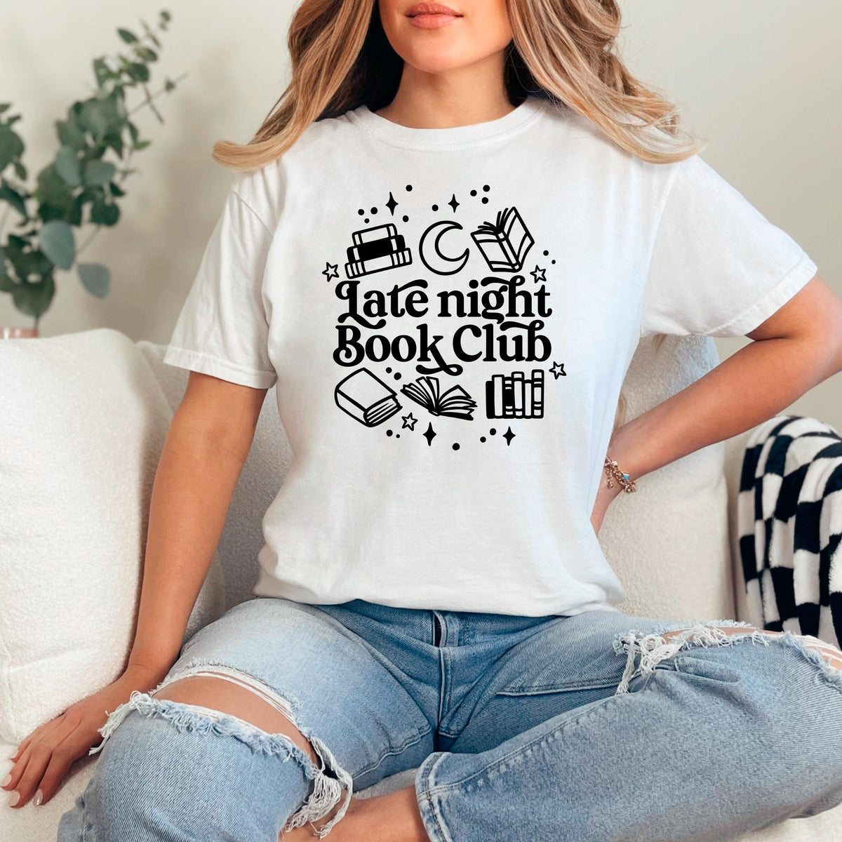 White crewneck tee with 'Late night Book Club' books, moon, and stars graphic