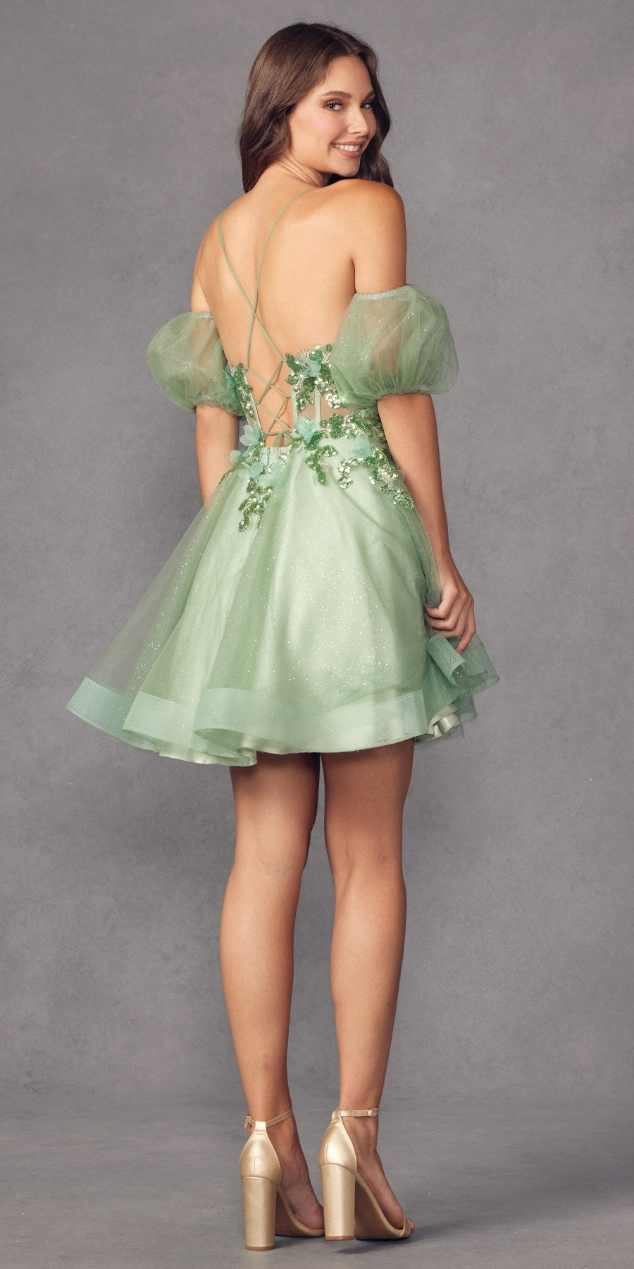 Sea green glitter tulle A-line dress with removable puff sleeves, open back and bow detail