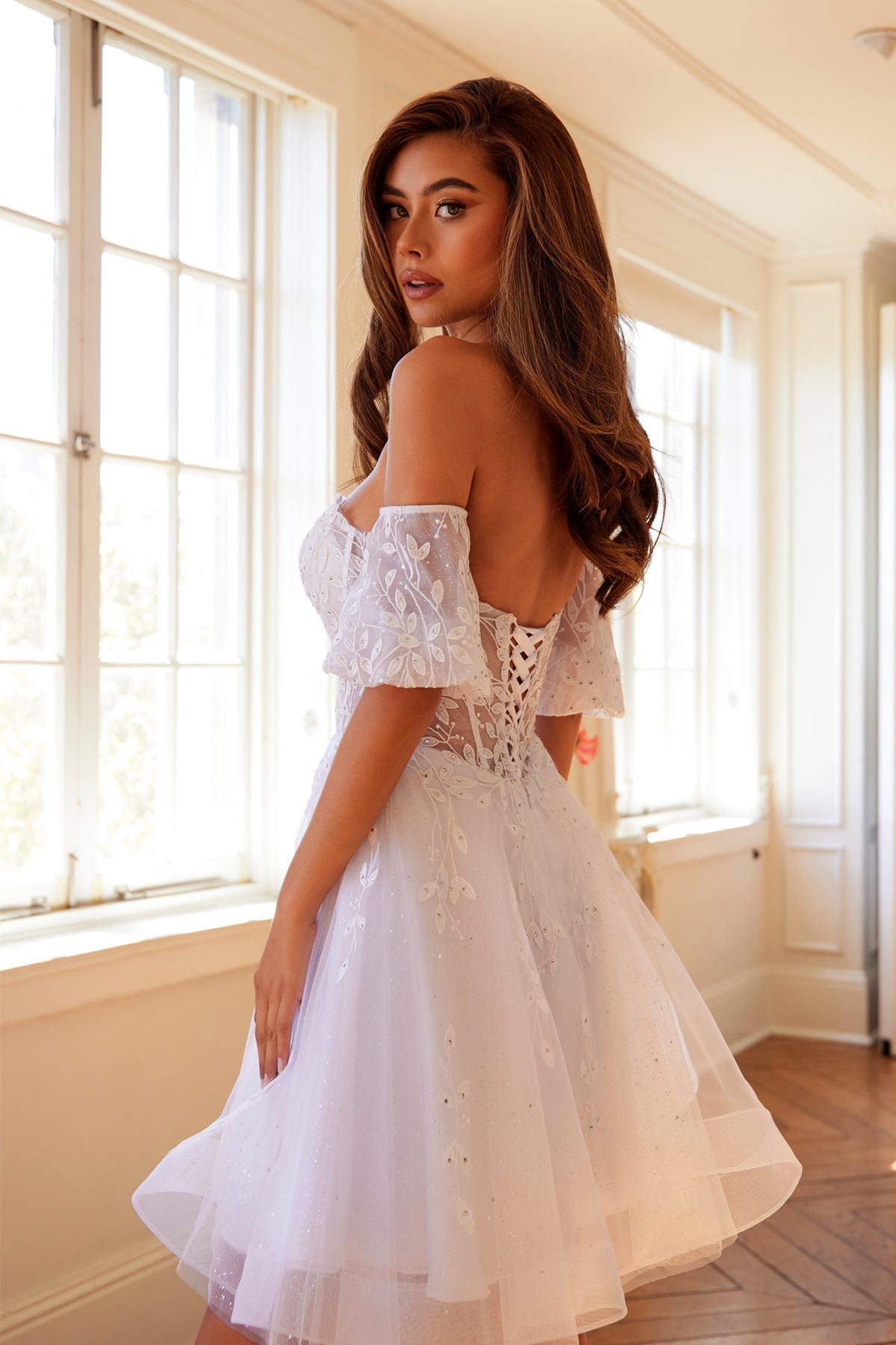 White short A-line dress with lace bodice and off-shoulder ruffle puff sleeves