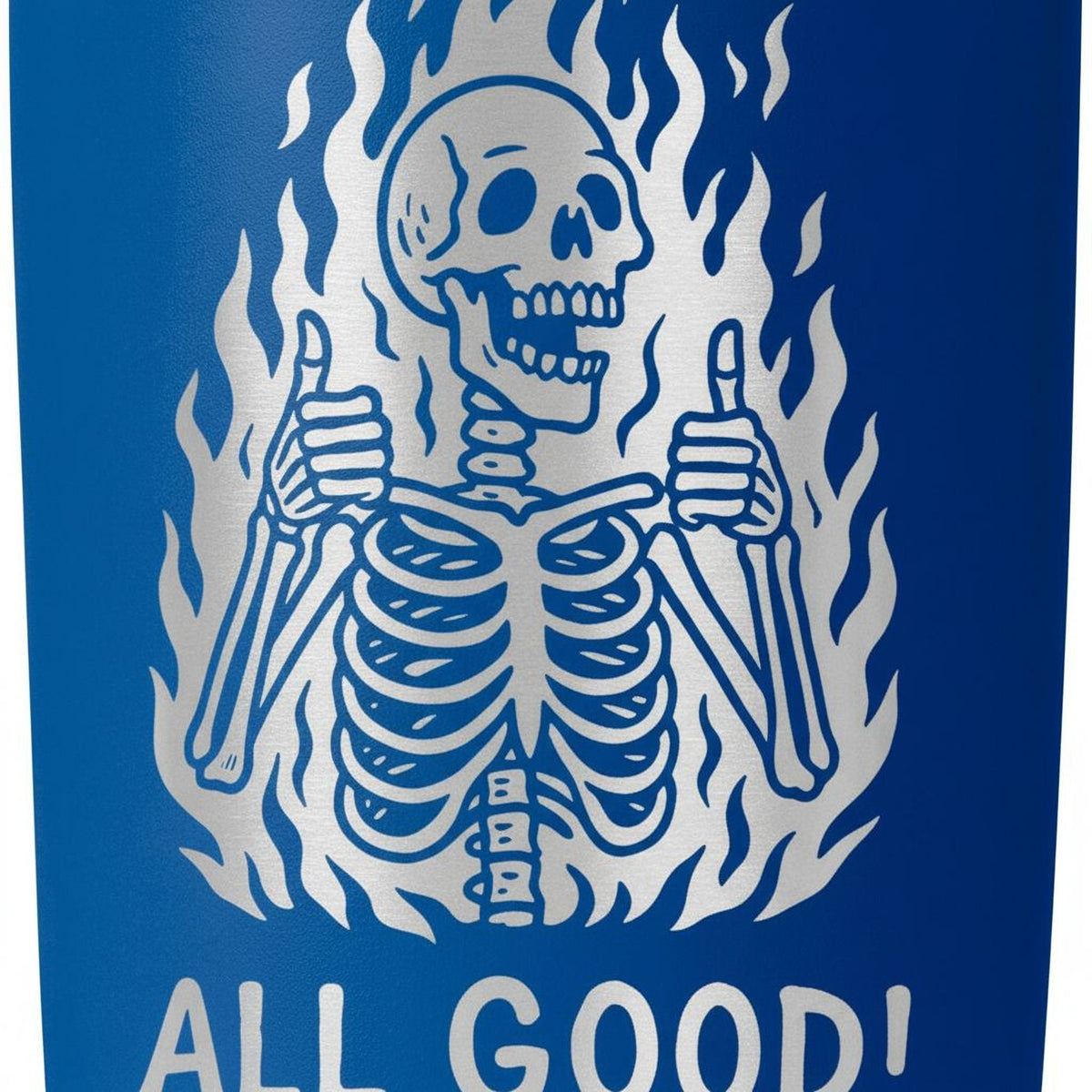 Blue insulated travel tumbler close-up with flaming skeleton graphic and “ALL GOOD!” text