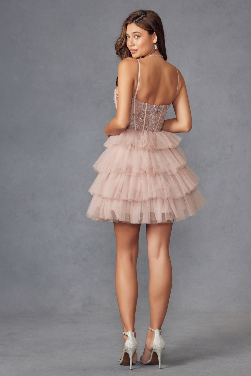 Back view of lilac lace corset mini dress with tiered tulle ruffle skirt