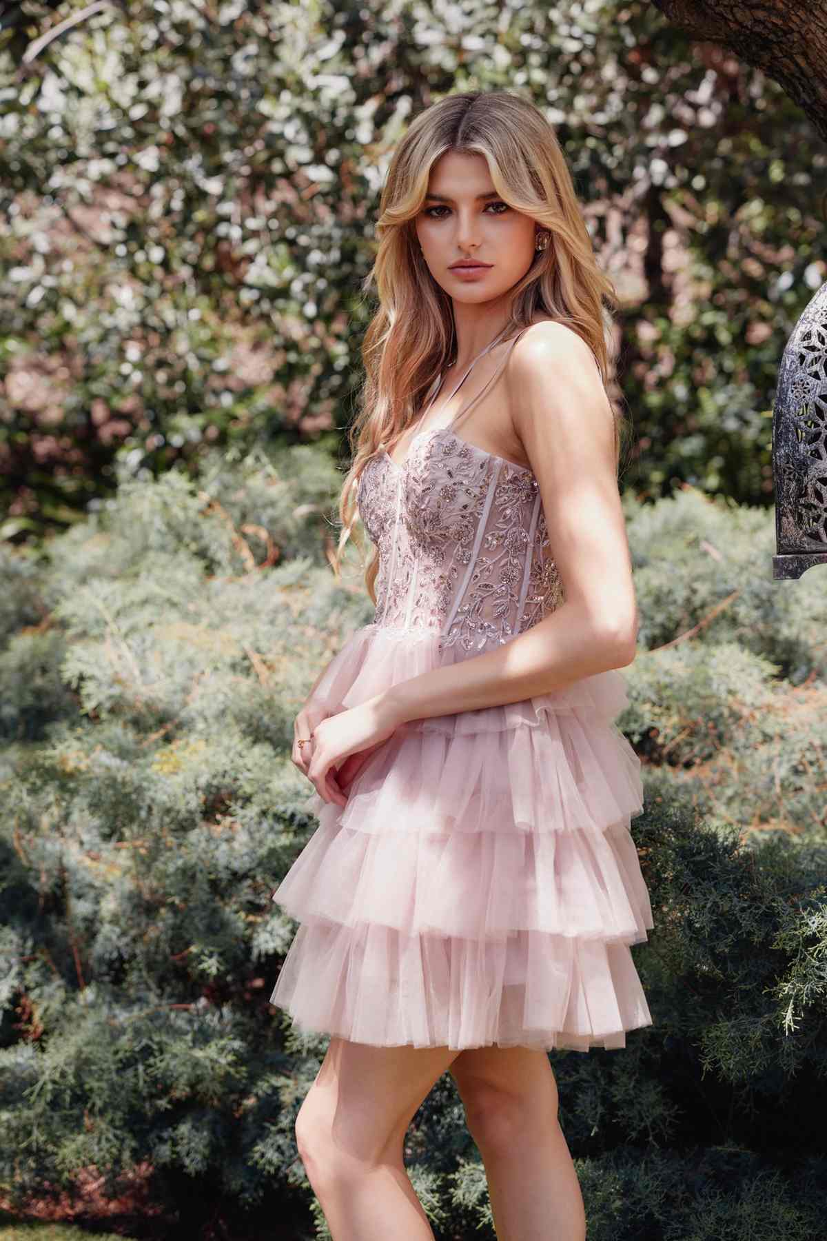 Blush pink tulle mini dress with lace corset bodice and layered ruffle hem