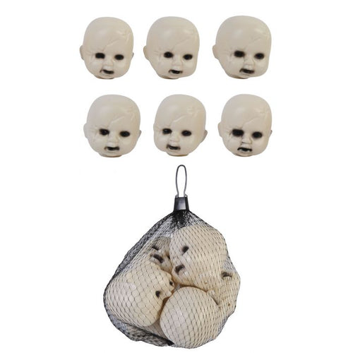 Set of six small plastic creepy doll heads in a mesh bag
