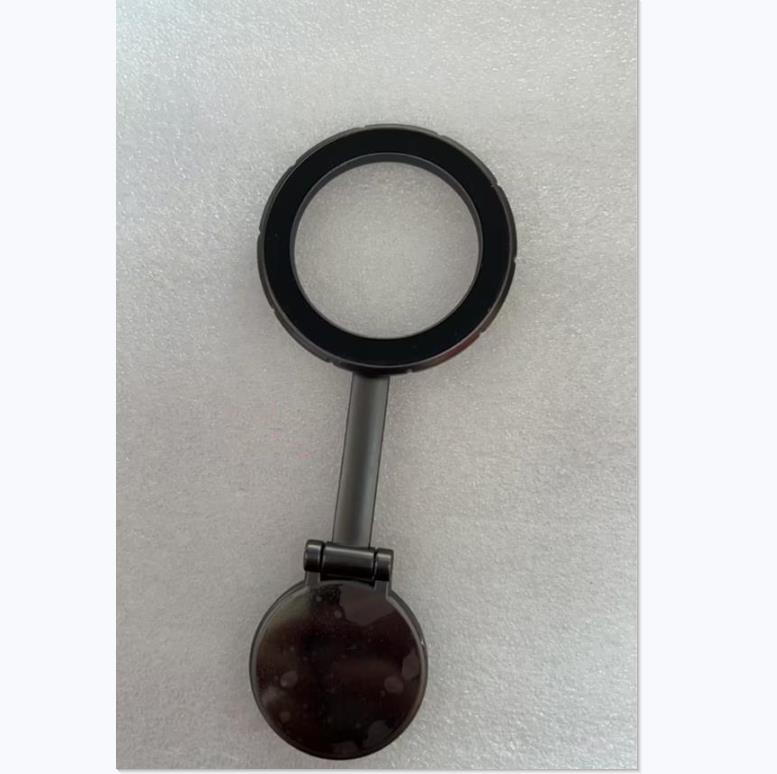 Magnetic phone mount close-up with black ring frame and connector