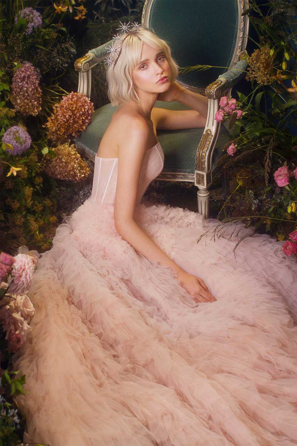Pink strapless tiered long formal dress with corset bodice and layered skirt
