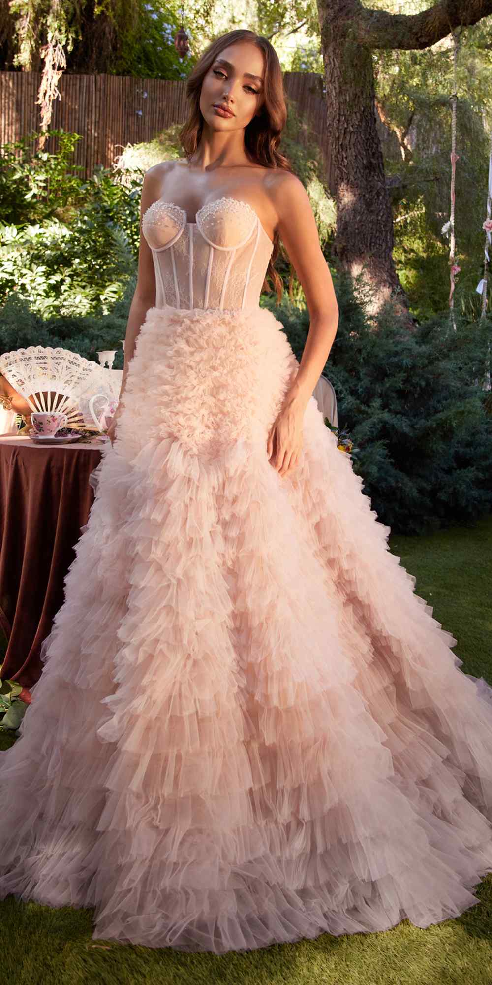 Strapless tiered long formal dress with corset-style bodice and fluffy layered ruffles
