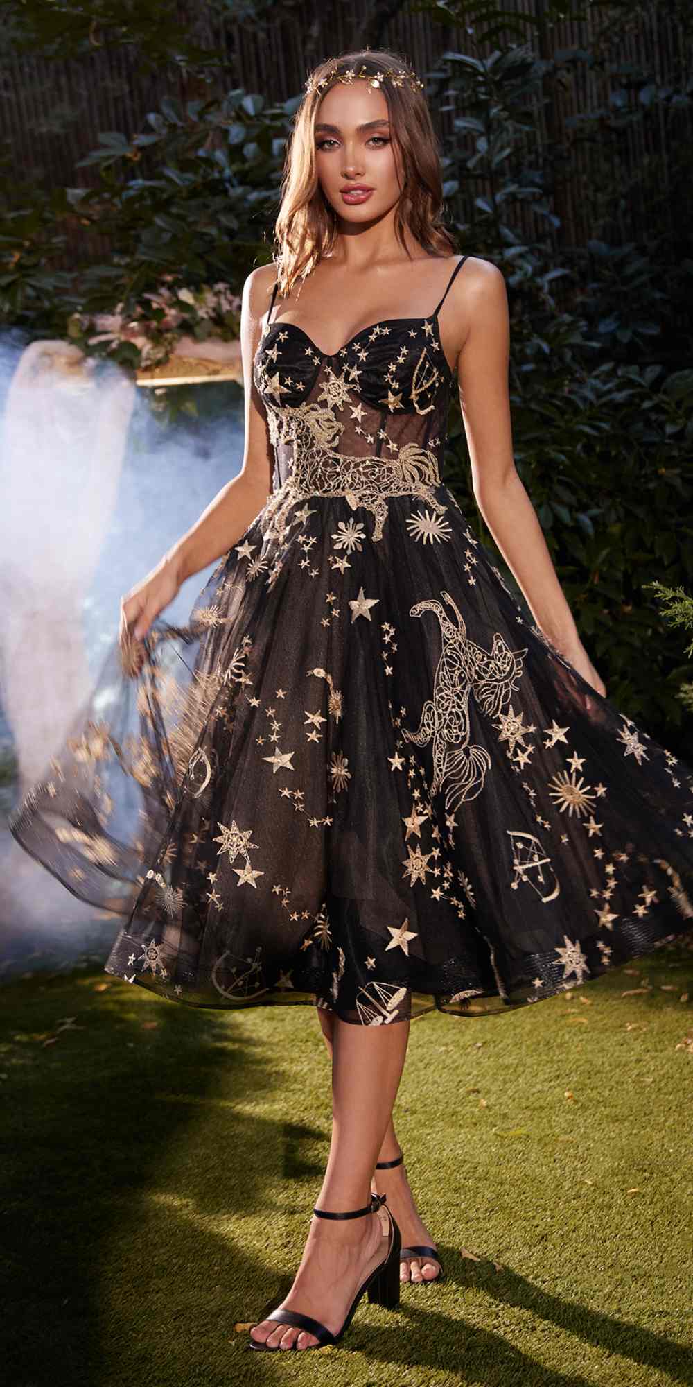 Black short prom dress with illusion bodice and gold star embroidery, flared skirt