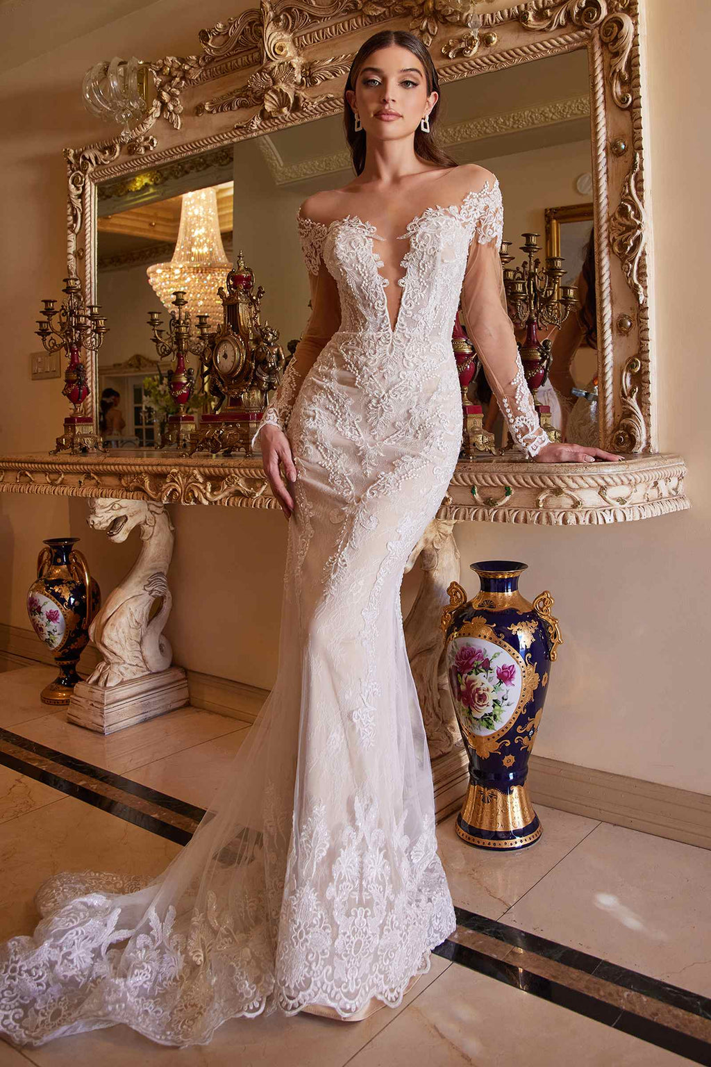 Off-white bohemian lace mermaid gown with illusion sleeves and sheer lace bodice