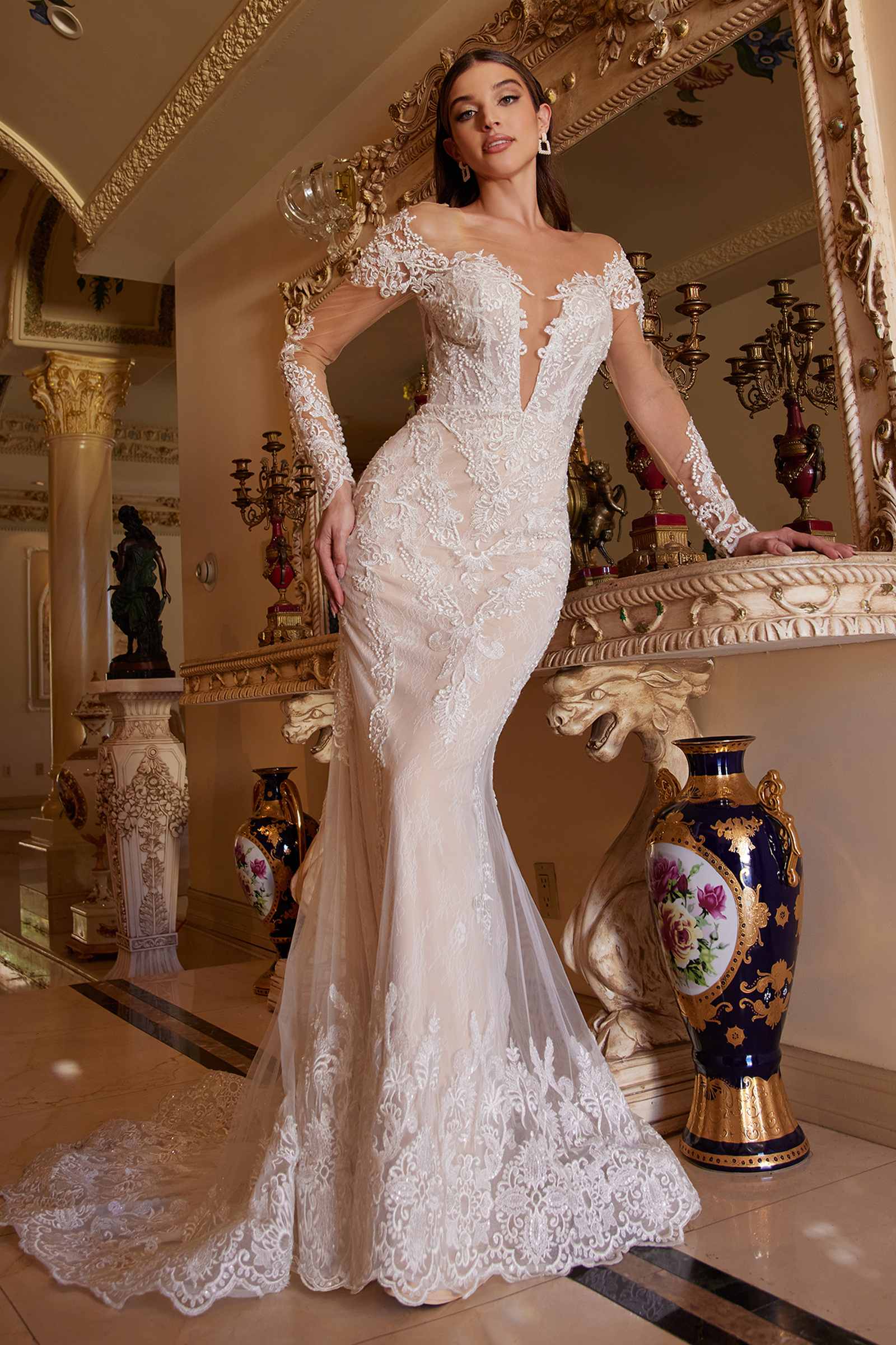 Off-white lace mermaid gown with fitted silhouette and ornate lace appliques