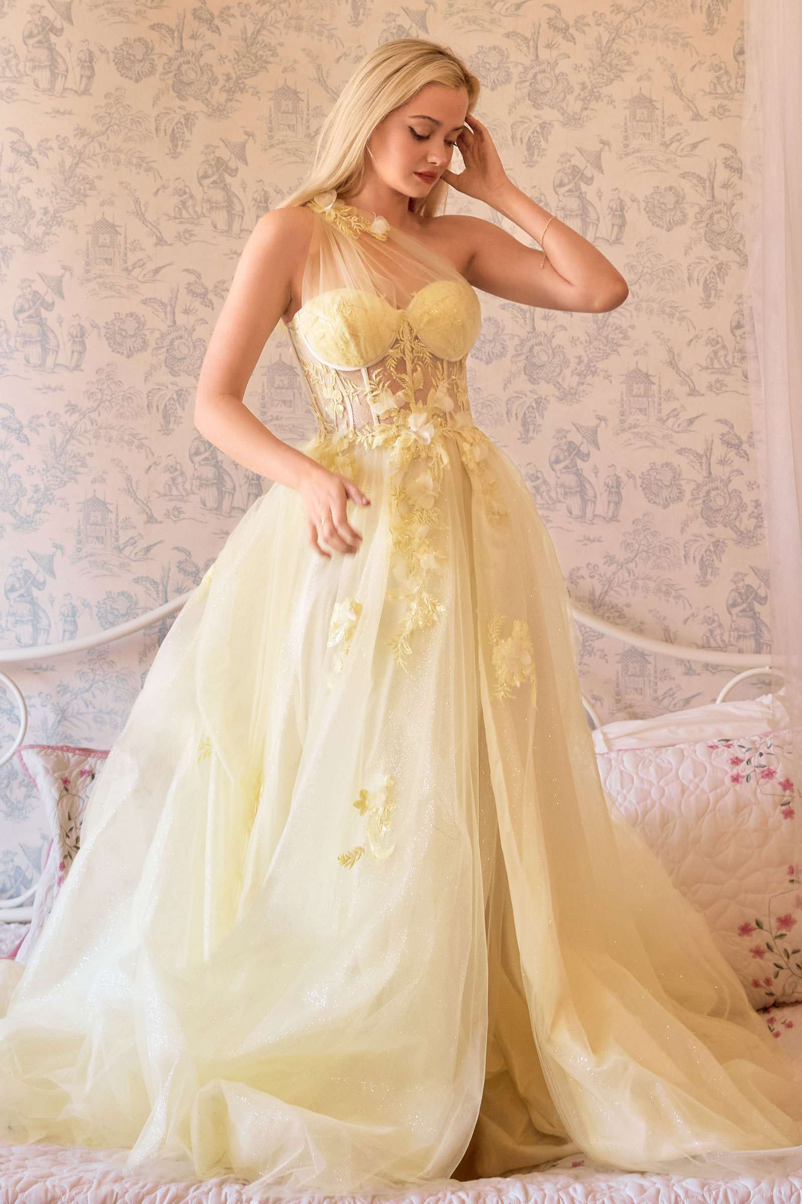 A-line ball gown with sweetheart bodice, embroidered detailing, and flowing tulle skirt