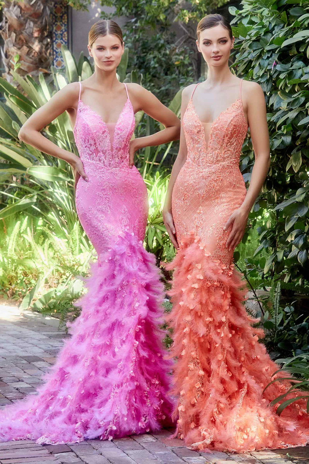 Hot pink feathered mermaid gown with V-neck and spaghetti straps, fitted bodice.
